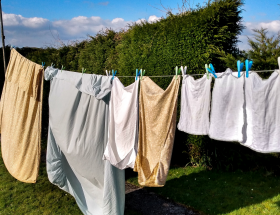 Featured image air drying laundry. Why and how to spring clean by a Hopeful Home.